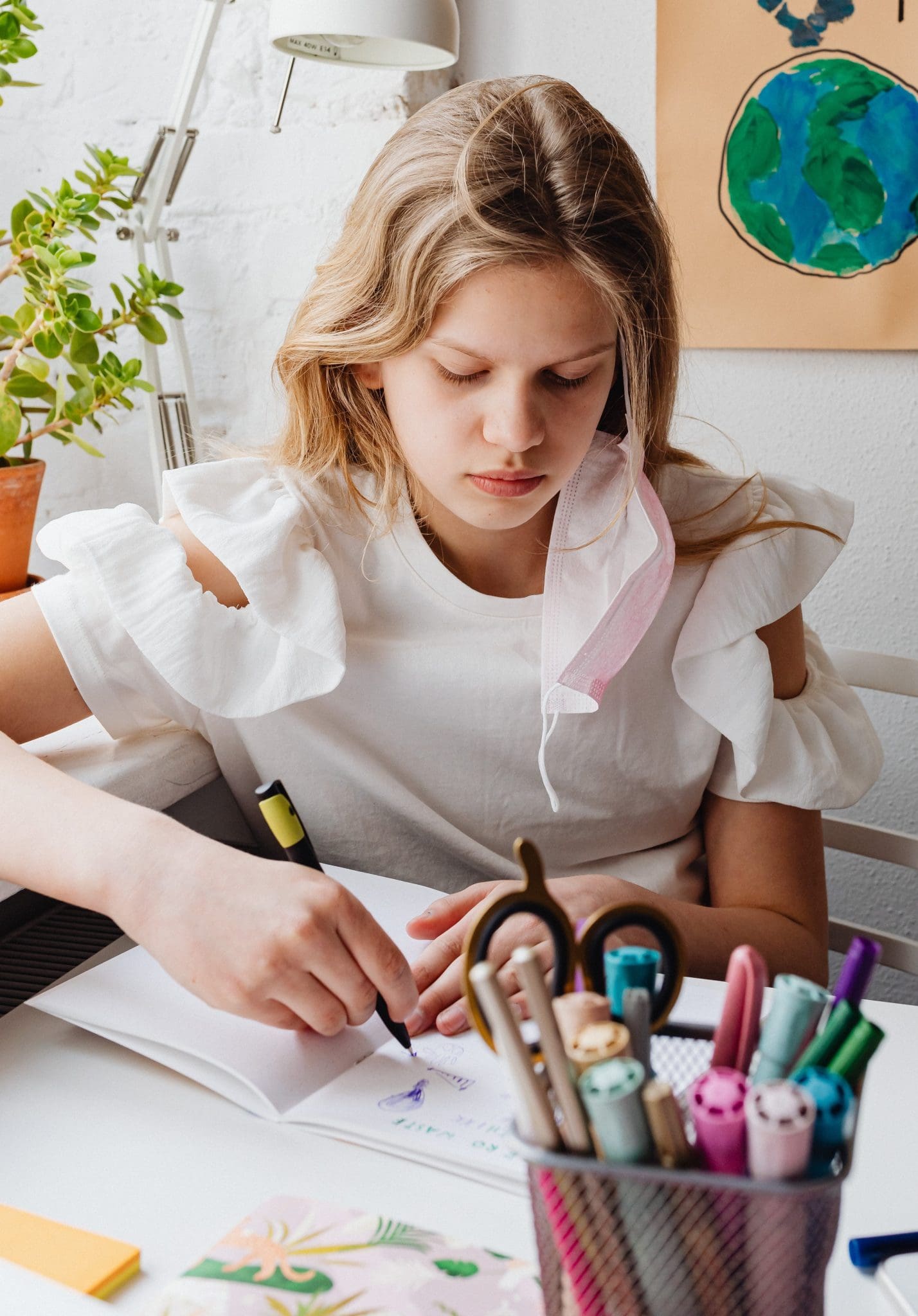 Young Girl with Pens